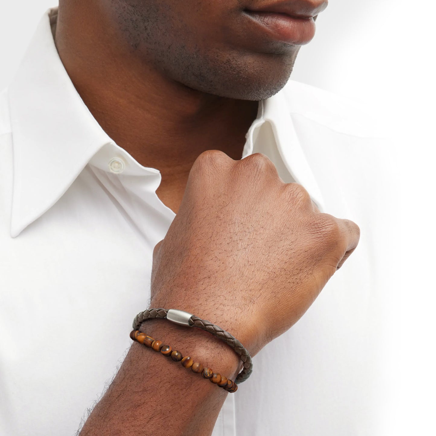 Male model wearing the Adam Bracelet Stack.