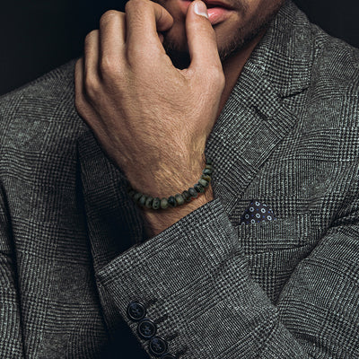 Close up of male models wrist donning the Semiprecious Gemstone Beaded Elastic Bracelet from Jan Leslie of NYC. 