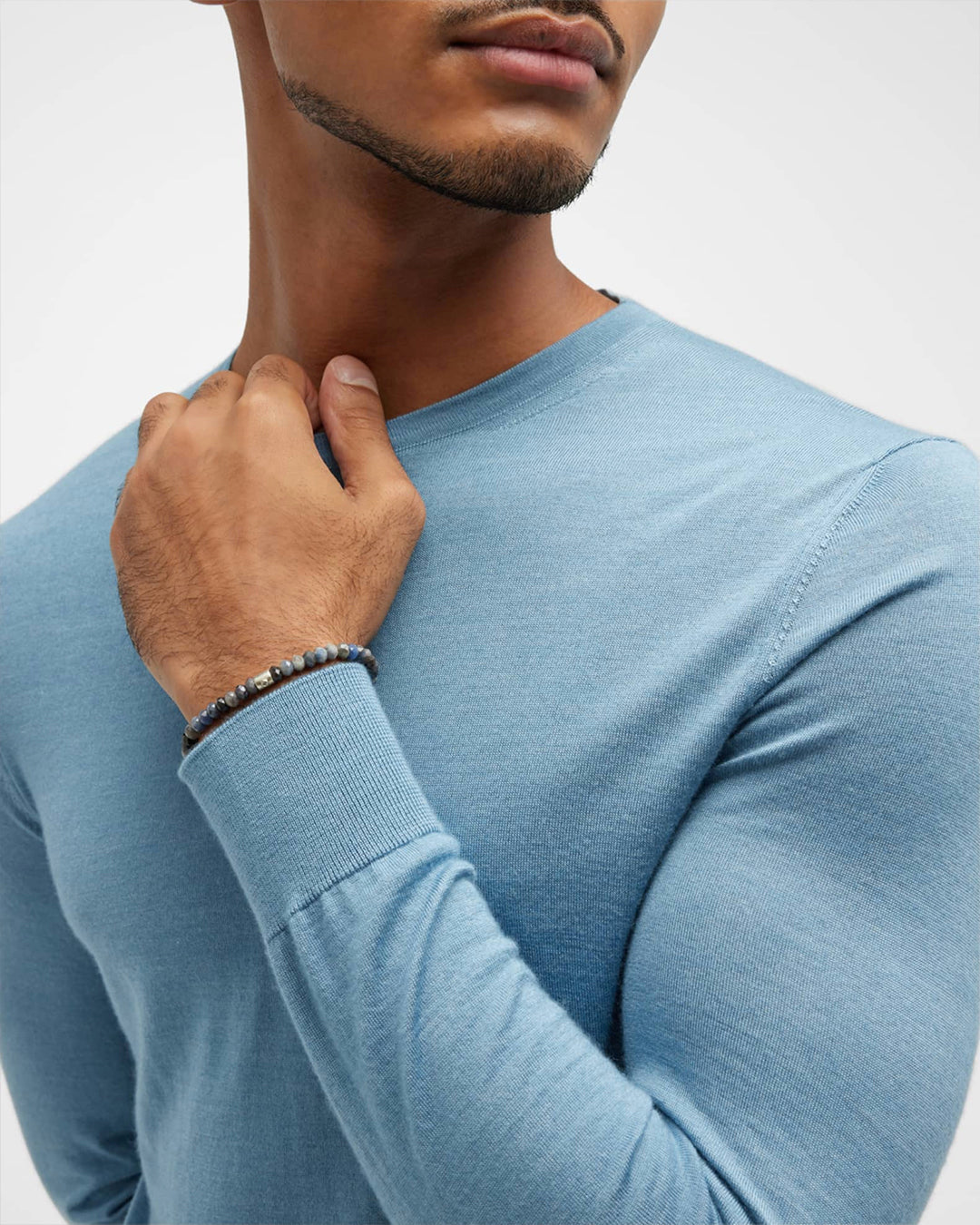 Male model wearing Sapphire Bead Bracelet with Diamond Accent Silver Tube.