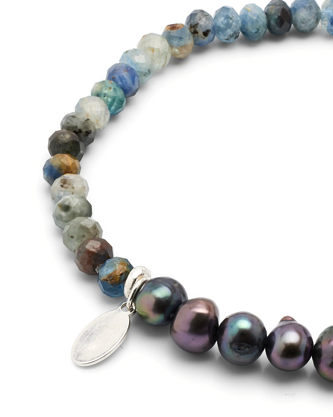 Close up of the smooth fresh water pearls and faceted sapphire gemstones on the Blue Sapphire and Freshwater Pearls Split Beaded Bracelet. Jan Leslie Cufflinks and Accessories.