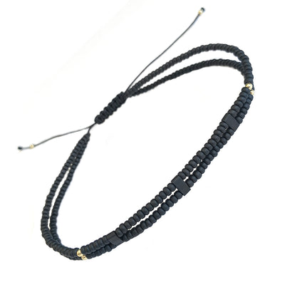 Front view of the Double Strand Black Micro Bead Wax Pull Cord Sterling Silver Bracelet. 