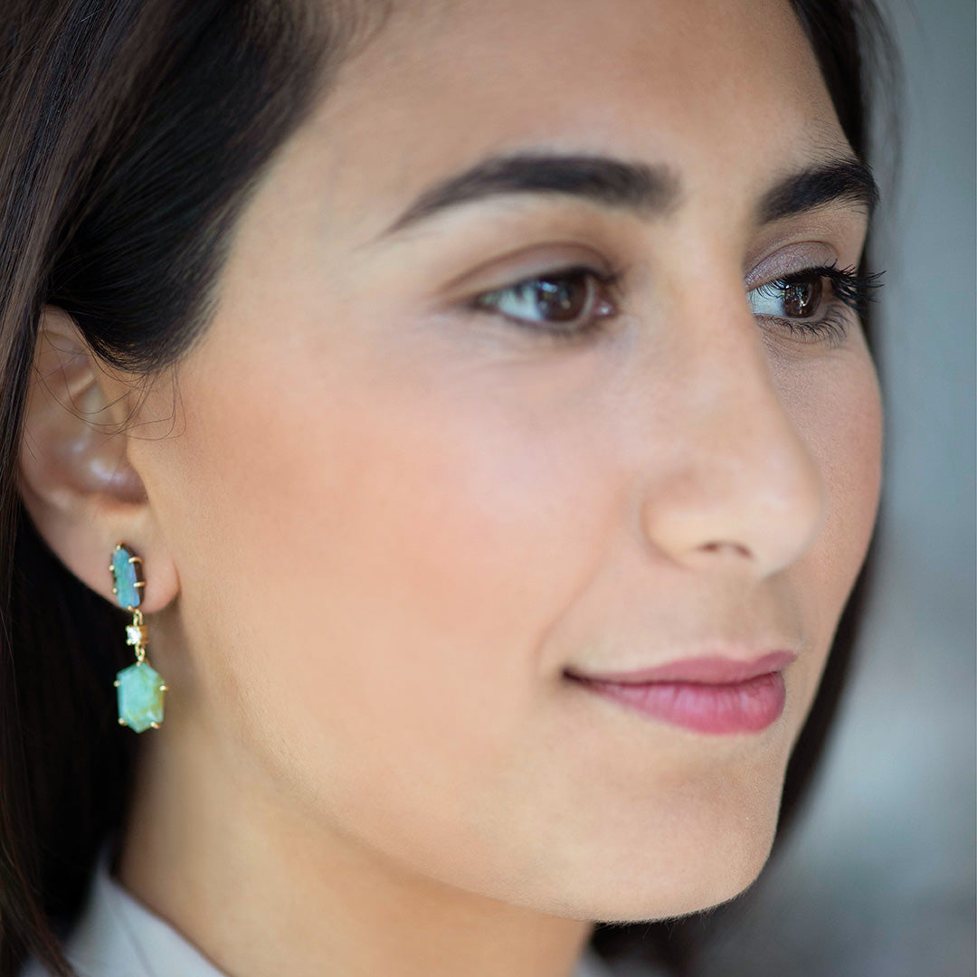 Close up of model wearing Corsica 18K Gold One of a Kind Earrings.