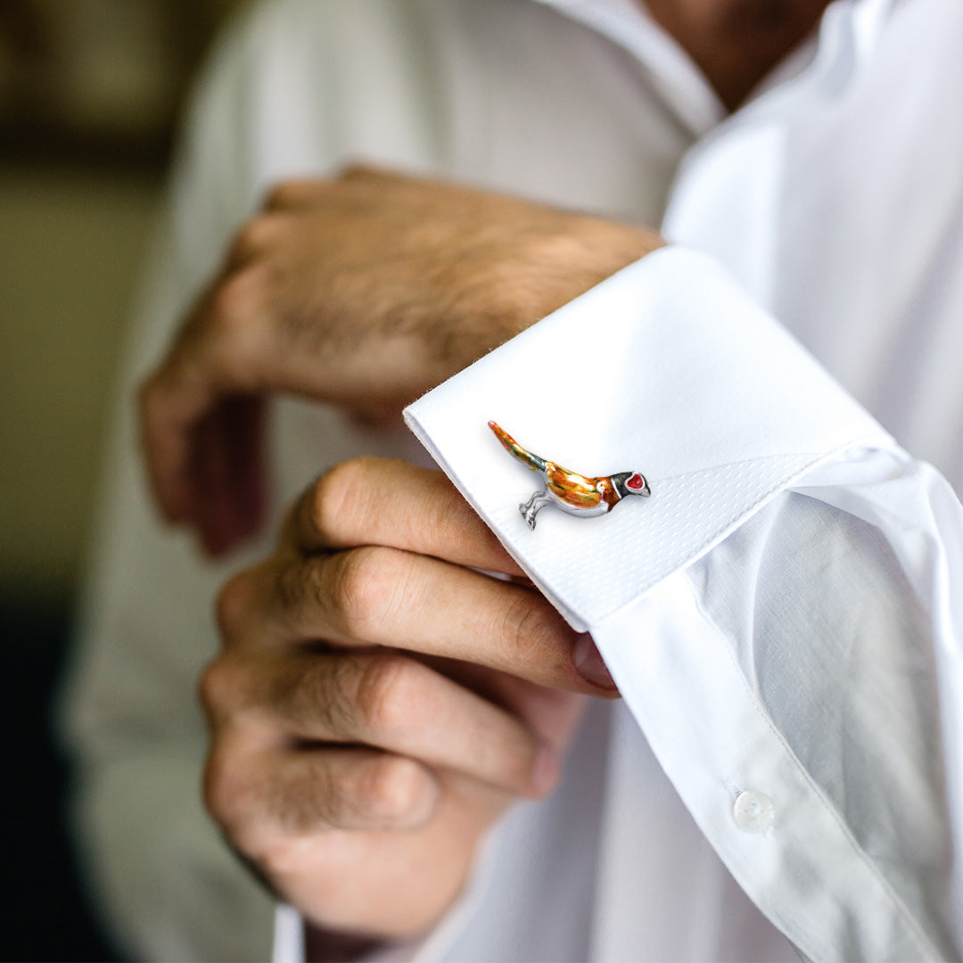 Enamel Pheasant Sterling Silver Cufflinks on a white cuffed shirt.