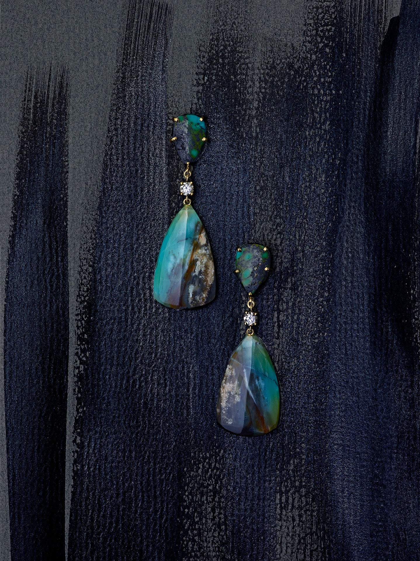 Great Barrier Reef 18K Gold One of a Kind Gemstone Earrings on a black background.