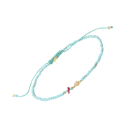 Handcrafted adjustable turquoise beaded bracelet featuring a gold evil eye charm
