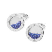 Sterling silver round cufflinks with floating loose sapphires behind glass bezel by Jan Leslie.