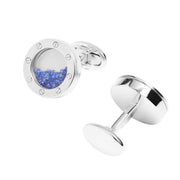Sterling silver round floating sapphire cufflinks with screw bezel and bullet-back toggle by Jan Leslie.