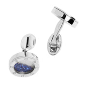 Sterling silver floating sapphire cufflinks with T-bar back showing loose sapphires in glass bezel by Jan Leslie.