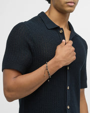 Men's black and natural bone heishi disc bead bracelet with engraved Jan Leslie sterling silver barrel clasp