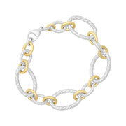 Chunky two-tone oval link bracelet with textured braided sterling silver links and polished gold vermeil connectors — a bold, luxurious chain bracelet that makes an effortless everyday statement.