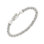 Bold oxidized sterling silver rope-textured bracelet with polished barrel end caps and a classic toggle clasp closure.