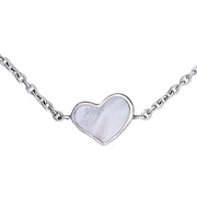 Close-up of white mother-of-pearl bezel heart station sterling silver bracelet — Jan Leslie