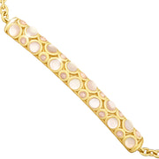 Gold vermeil white mother-of-pearl and crystal bubble bar bracelet angled close-up showing iridescent MOP cabochon detail by Jan Leslie