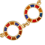 Close-up of multicolor lapis, carnelian, and tiger's eye tile inlay open circle stations on gold bracelet — Jan Leslie