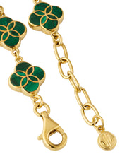 18K gold vermeil malachite petal Seed of Life station bracelet close-up showing quatrefoil station with Seed of Life gold lattice over deep forest green malachite with vivid emerald banding and natural black matrix by Jan Leslie