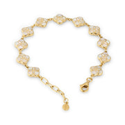  gold vermeil sterling silver multi-station white mother of pearl floral lattice quatrefoil bracelet with polished gold rolo chain links, lobster clasp, paperclip extender chain, and engraved JL Jan Leslie disc charm