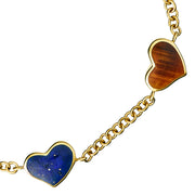 Close-up of carnelian bezel heart pendant on gold rolo chain bracelet — Jan Leslie