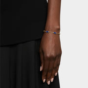  Model wearing gold vermeil five-station lapis lazuli rectangle bracelet on wrist by Jan Leslie.