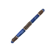 Close-up diagonal view of royal blue lapis lazuli cylinder tube beads