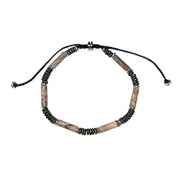 Adjustable black cord bracelet with dark red jasper tube beads and oxidized silver disc spacers, luxury bohemian men's gemstone jewelry.
