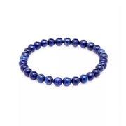 Lapis lazuli round bead stretch bracelet with natural pyrite flecks on elastic cord — Jan Leslie