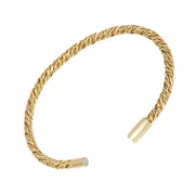 Gold twisted rope cuff bracelet with magnetic cylinder clasp ends, open bangle style.