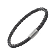Grey five-strand braided leather bracelet with gunmetal magnetic barrel clasp angled view showing braid texture and clasp detail by Jan Leslie