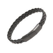 Wide black braided leather cuff bracelet with chunky herringbone weave and matte gunmetal rectangular push-button magnetic clasp, luxury men's leather jewelry.