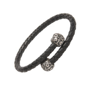 Black braided leather open-cuff bracelet with dual oxidized sterling silver tribal skull end caps.