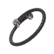 Black braided leather open-cuff bracelet with dual oxidized sterling silver lion head end caps featuring.
