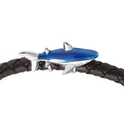 Close-up of sterling silver blue enamel shark charm centerpiece on black braided leather bracelet.