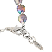 Close-up of sterling silver 925 lobster clasp and extender chain on iridescent gray baroque pearl bracelet.