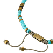 Close-up of turquoise heishi beads with antique brass and black onyx spacer detail, Jan Leslie