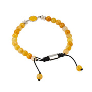 Yellow agate adjustable bracelet showing 925-stamped sterling silver barrel clasp and black cord adjustment detail, Jan Leslie
