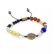 Multi-gemstone adjustable bracelet with antique brass coin charm, rudraksha, matte onyx, blue lotus, gold and crystal beads, Jan Leslie