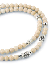 Men's natural riverstone double-wrap bracelet with sterling silver spacers, lava stone accent, and Jan Leslie