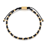 Black onyx seed bead and gold vermeil faceted bead bracelet with adjustable macramé cord and gold clasp — Jan Leslie