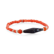 Coral red glass bead stretch bracelet with Tibetan dzi agate centerpiece and sterling silver rondelle spacers, Jan Leslie