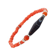 Coral red tube glass bead bracelet with matte carnelian round beads, Tibetan dzi agate centerpiece, and silver rondelle spacers, Jan Leslie