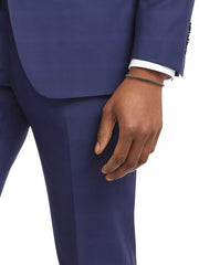 Oxidized gunmetal twisted cable open cuff bracelet worn with navy suit and white dress shirt, Jan Leslie