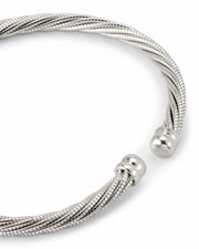 Close-up of polished sterling silver dome end caps on twisted multi-strand cable cuff bracelet, Jan Leslie