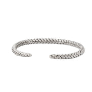 Oxidized sterling silver herringbone woven open cuff bracelet with antiqued finish.