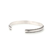 Sterling silver oxidized rope-edge triple-channel open cuff bracelet top-down profile showing polished center rail and oxidized twisted rope border by Jan Leslie