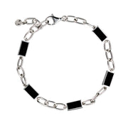 Sterling silver oval paperclip chain bracelet with black onyx rectangular station links full flat view showing five black onyx bezel stations lobster claw clasp extender chain and Jan Leslie disc tag by Jan Leslie