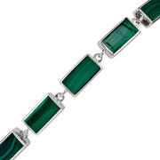 Sterling silver malachite rectangular station tennis bracelet close-up showing deep forest green malachite with vivid emerald banding and natural black matrix in polished silver chamfered bezels with direct jump ring connections by Jan Leslie
