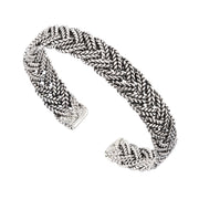 Oxidized sterling silver wide multi-strand Balinese foxtail woven cuff bracelet full silhouette showing interlaced braid pattern and squared open ends by Jan Leslie