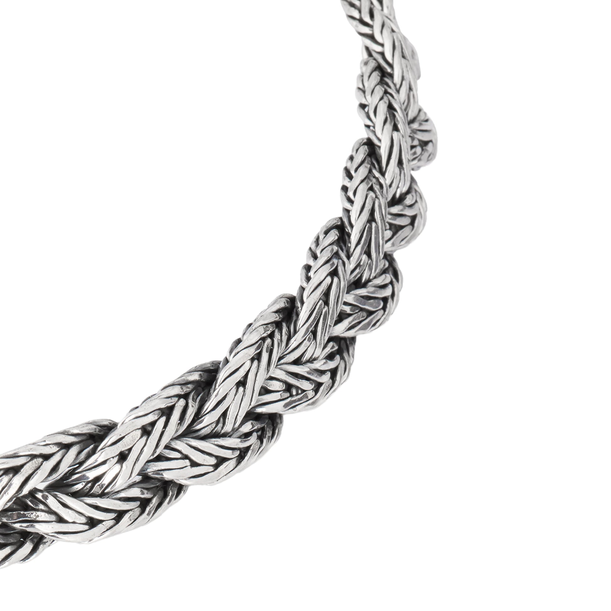 Oxidized sterling silver double-strand Balinese foxtail chain bracelet angled view showing hand-woven chain texture engraved barrel caps and hook clasp detail by Jan Leslie