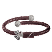 Black double-strand braided leather bypass cuff bracelet with two pavé crystal golf ball end caps and black enamel golf bag clasp with silver golf club detail