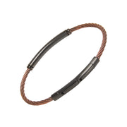 Two-tone copper twisted cable bracelet with a black PVD curved tube bar station and push-clasp closure.