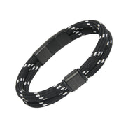 Double-strand black and white paracord rope bracelet with a matte black magnetic clasp and gunmetal ring connectors.